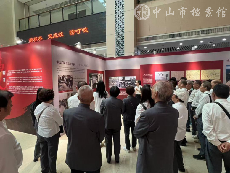 1761190366338413.jpg 图5:9月9日,中山市西区澳门联谊会到市档案馆参观 副本.jpg